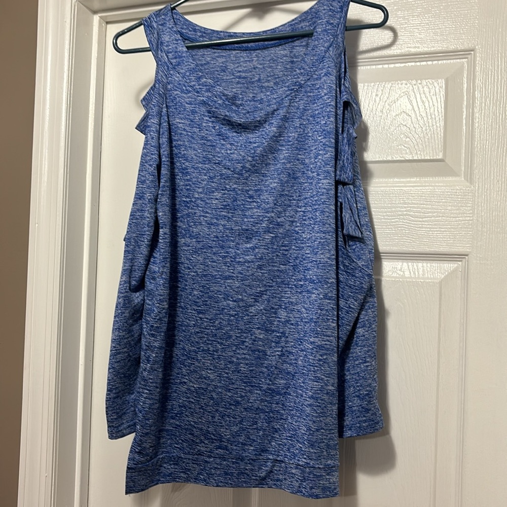 Long sleeve shirt with slits down the arm